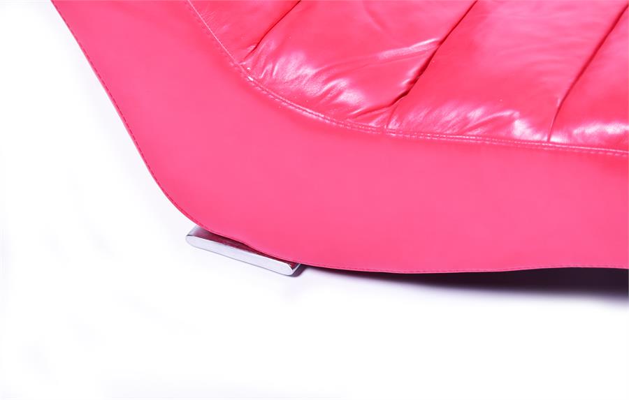 A contemporary Italian Contempo red leather upholstered recliner the curved form with over-stuffed - Image 4 of 10