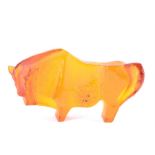 A 1970s Czech Majak Jablonec orange cast glass bison sculpture designed by Professor Jan Cerny, with