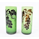 A pair of late 20th century cameo glass vases the green bodies flashed with a layer dark brown glass