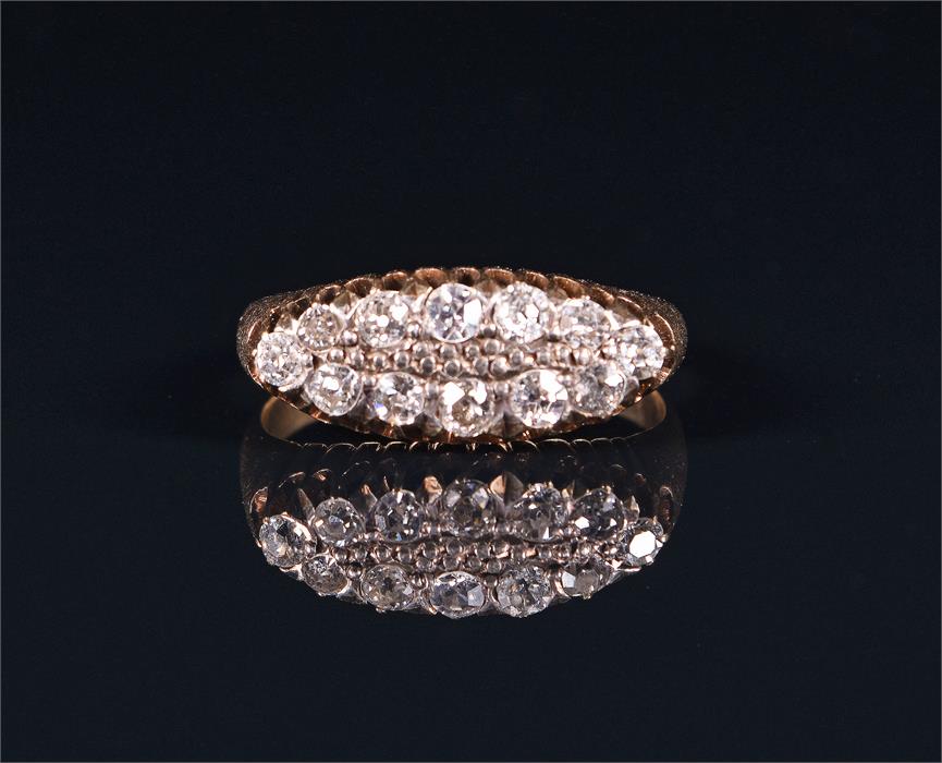 An 18ct yellow gold and diamond ring the navette-shaped mount pave set with twelve round brilliant-