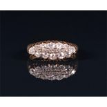 An 18ct yellow gold and diamond ring the navette-shaped mount pave set with twelve round brilliant-