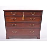 A George III mahogany bachelors chest of four long graduated drawers with brass handles, and
