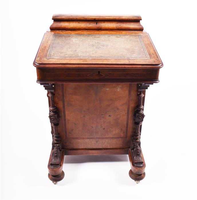 A Victorian figured walnut Davenport the top with stationery compartment, and rising writing surface - Image 9 of 9