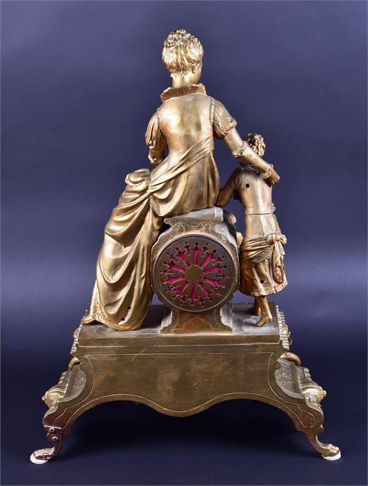 A late 19th century French spelter mantel clock formed as a woman and child reading a book, upon a - Image 8 of 9