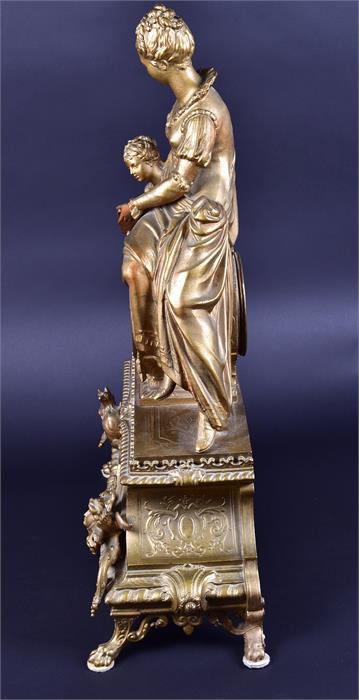 A late 19th century French spelter mantel clock formed as a woman and child reading a book, upon a - Image 7 of 9