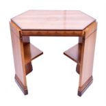 An Art Deco walnut two tier occasional table with diamond shaped ends, and two internal lower