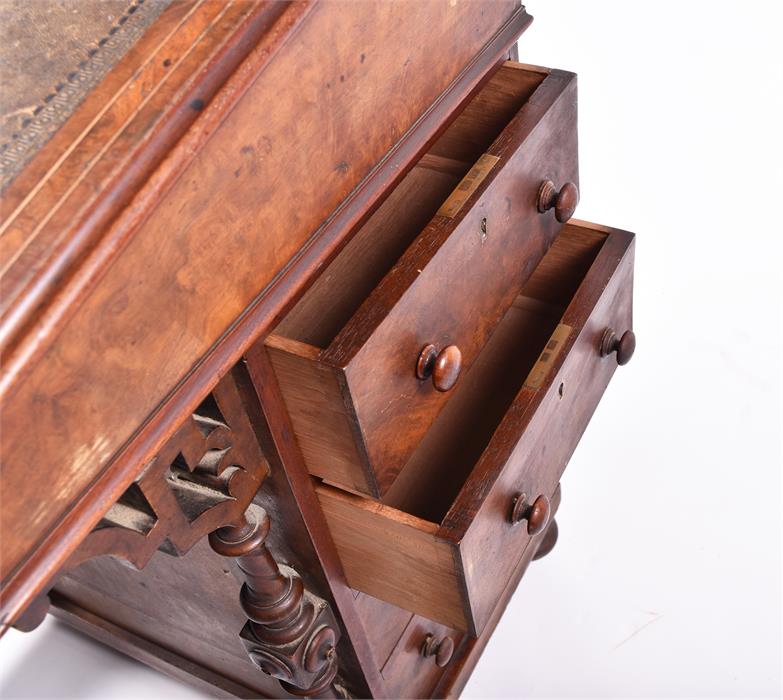 A Victorian figured walnut Davenport the top with stationery compartment, and rising writing surface - Image 6 of 9