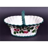 A Wemyss fluted basket with twisted handle  with typical green borders, the flared bowl decorated to