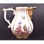 A 19th century Meissen milk jug segmented in four parts and decorated with scenes of Oriental