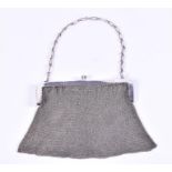 A 1930s Continental silver mesh purse with simple figaro strap. 8.5 ozt.