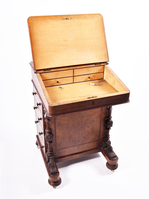 A Victorian figured walnut Davenport the top with stationery compartment, and rising writing surface - Image 4 of 9