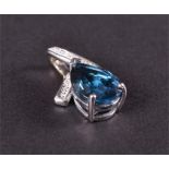 A 9ct white gold, diamond, and London Blue topaz pendant set with a pear-cut topaz of