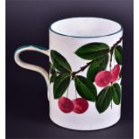 A large Wemyss tankard hand painted with cherries set within green border, with applied moulded