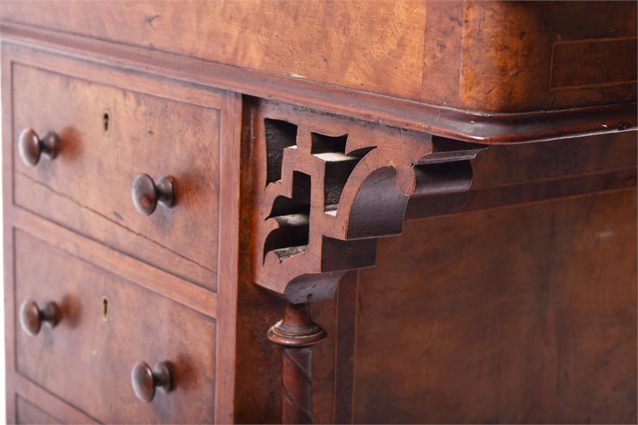 A Victorian figured walnut Davenport the top with stationery compartment, and rising writing surface - Image 7 of 9