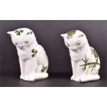 Two small Plichta models of cats,  one hand painted with flowering thistles, the other with clovers,