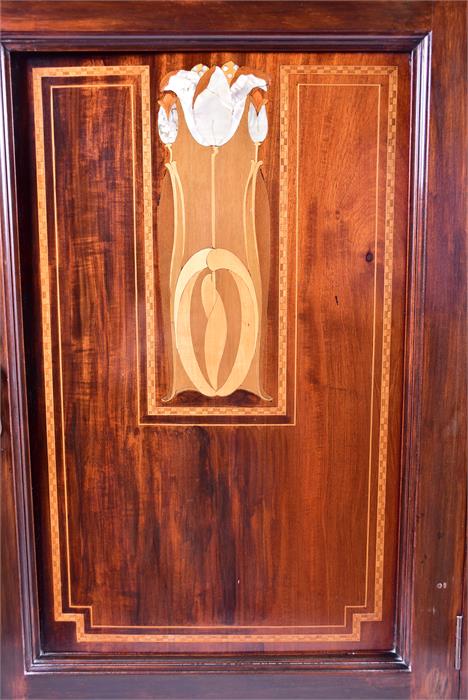 An Art Nouveau mahogany music cabinet the panel door inlaid with mother-of-pearl, opening to - Image 3 of 8