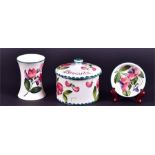 A Wemyss lidded biscuit barrel, a tapering cylindrical vase and a pin dish  all decorated with