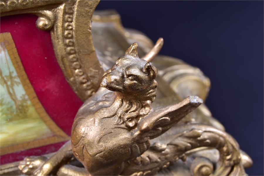 A late 19th century French spelter mantel clock formed as a woman and child reading a book, upon a - Image 6 of 9