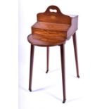 An unusual Edwardian mahogany inlaid valet stand with shell inlay, and two hinged lidded