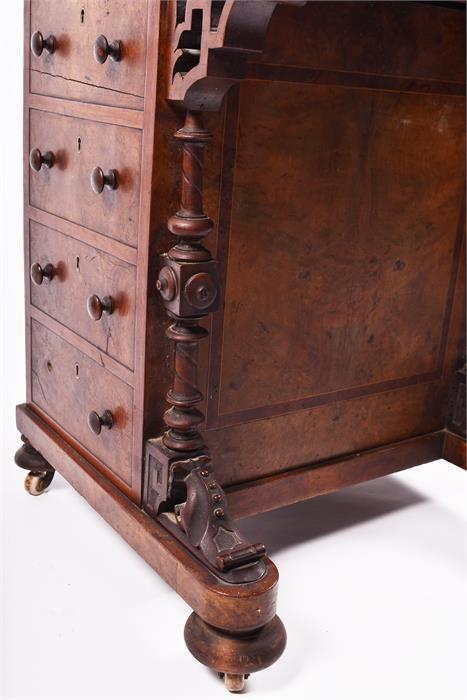 A Victorian figured walnut Davenport the top with stationery compartment, and rising writing surface - Image 8 of 9