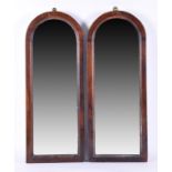 A small pair of early 20th century mahogany pier mirrors with domed tops and bevelled glass. 64 x