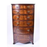 A Georgian style mahogany bow front chest of six drawers with J.E.A.S Pat Lever 2232/12 locks and