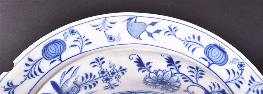 A Meissen blue and white onion pattern part dinner service comprising two lidded tureens, five - Image 8 of 15