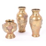 Three miniature brass and copper Oriental vases decorated with flowers and birds, largest 9.5 cm