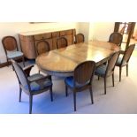 A 1930's French walnut and coromandel dining room suite comprising a dining table, eight dining