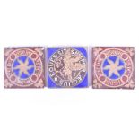 Three late 19th / early 20th century Minton ceramic tiles to include a pair centred with stylised