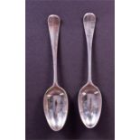 A pair of George III silver tablespoons London 1772, indistinct maker's mark, each with armorial