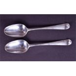 A pair of Queen Anne silver tablespoons London 1713, by John Bourne, each with armorial engraving to