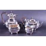 A four part George V silver tea set Sheffield 1927 by Walker & Hall, comprising coffee pot,