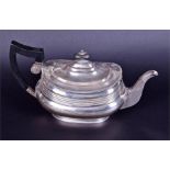 A George V silver teapot Sheffield 1918, by Albert Faulkner, with gadrooned rim and ebonised