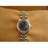 Pre-owned Rolex datejust 79174. _x00D_It has a 26mm Steel case._x00D_Blue dial._x00D_Roman hour