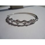 White Gold And Diamond Bangle.