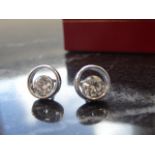 Hearing Stud with .05ct each earring for a total of 1ct.Clarity:I1.Colour:H.Including certificate.