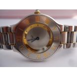 This Must de Cartier 21 is a pre-owned watch that can be worn by a man or woman. The watch is in