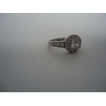 Halo design ring with high grade cubic zirconia 10k white gold Size: N 1/2 .