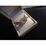 14k yellow gold 24 diamonds Total diamond weight approx.: 0.60 CT Clarity: VS Colour: F Omega clip