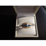 14K yellow gold Signed '585' for 14K. High grade cubic zirconia and lab created sapphires. Total