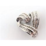 14k white gold 27 round brilliant cut diamonds and 44 baguette diamonds. Total diamond weight