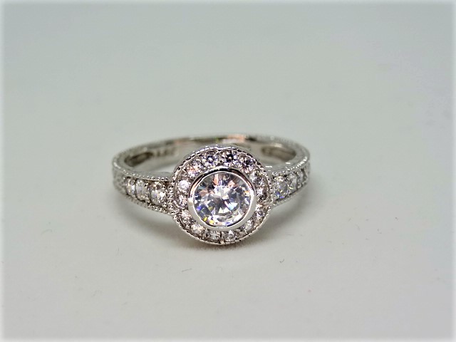 Ring Halo design ring with high grade cubic zirconia 10k white gold Size: N 1/2 .