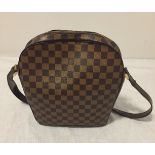 Authentic Louis Vuitton Ipanema GM shoulder bag in brown Damier canvas.