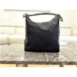 Authentic Gucci Hobo bag with leather trim in excellent pre owned condition. Bag has one big pocket