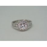 Ring Halo design ring with high grade cubic zirconia 10k white gold Size: N 1/2 .