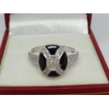 Onyx and Diamond Oval "X" Ring