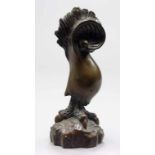Anlauf, W. (um 1983) Stilisierter Greifvogel. Bronze mit braun-grüner Patina. Am Sockel monog. "WA",