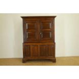 oak cabinet with 2 doors end hidden space, England 18 th century, h. 180, w. 135, d. 58 cm. Eiken