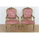 Pair of gold lacquer Louis XV-style armchairs with red fabrics, 19th century (armrest restored) Stel